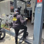 Boy riding an Electric Scooter