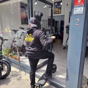 Boy riding an Electric Scooter