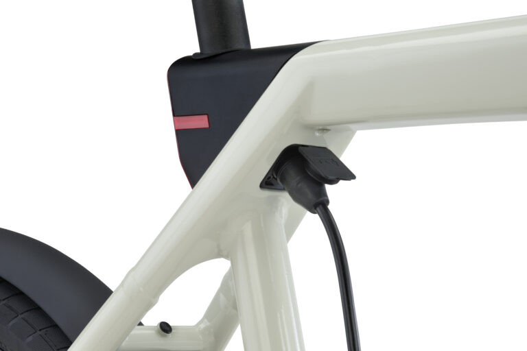 Raleigh One Electric Bike 19 Raleigh ONE white on bike charging