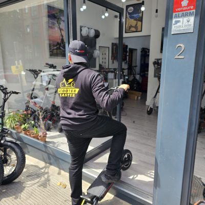 Boy riding an Electric Scooter